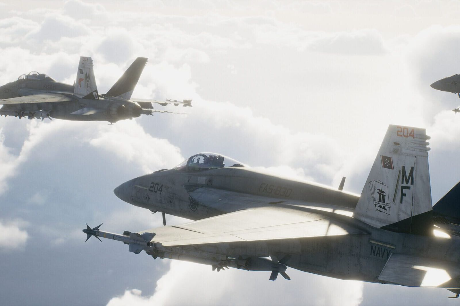 Three grey F/A-18 fighter jets flying in formation above white clouds in Ace Combat 8: Wings of Theve