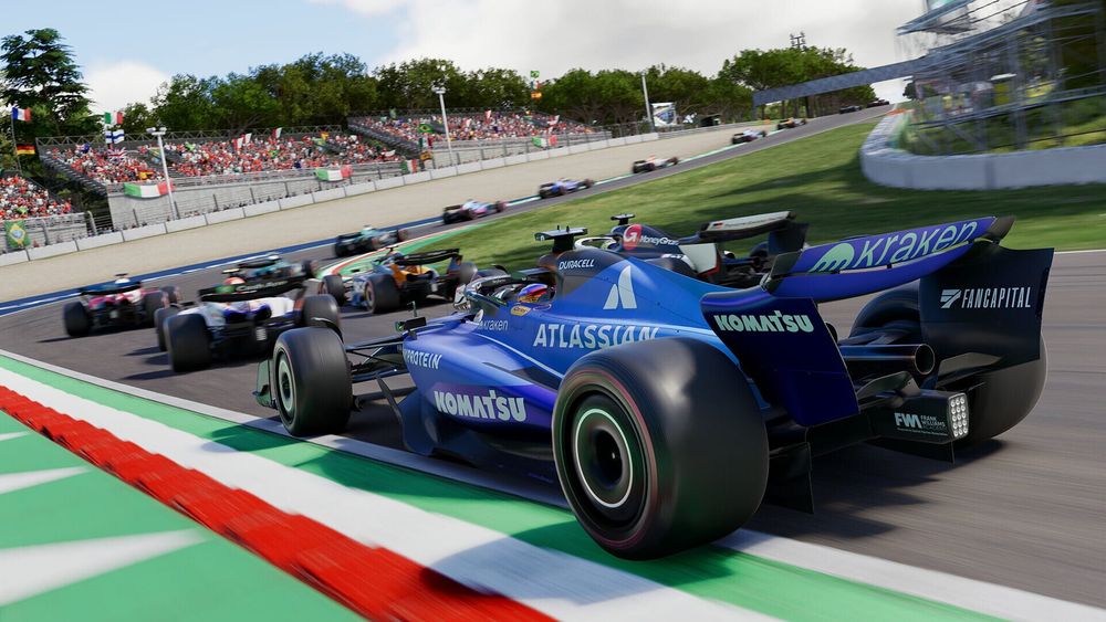A blue Williams Formula 1 car leads a pack of cars through a corner in F1 25