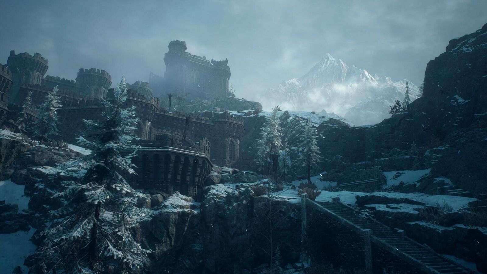 A ruined stone fortress on a snowy cliff above pine trees, with a white mountain peak behind it