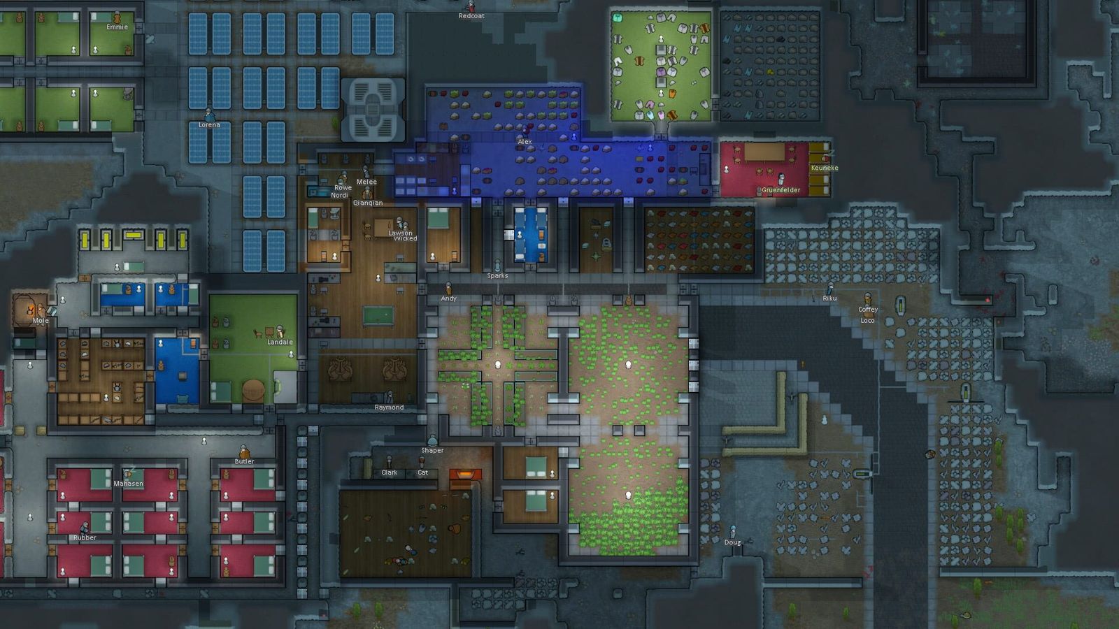 Top-down RimWorld screenshot of a large dark-floored base with bedrooms, a blue-lit storage room, a planted courtyard and rows of solar panels
