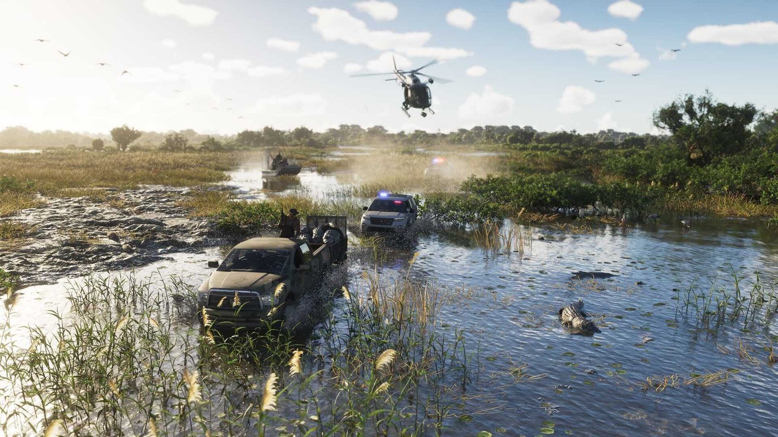 Off-road vehicles splash through a swamp while a helicopter flies low over the grassland