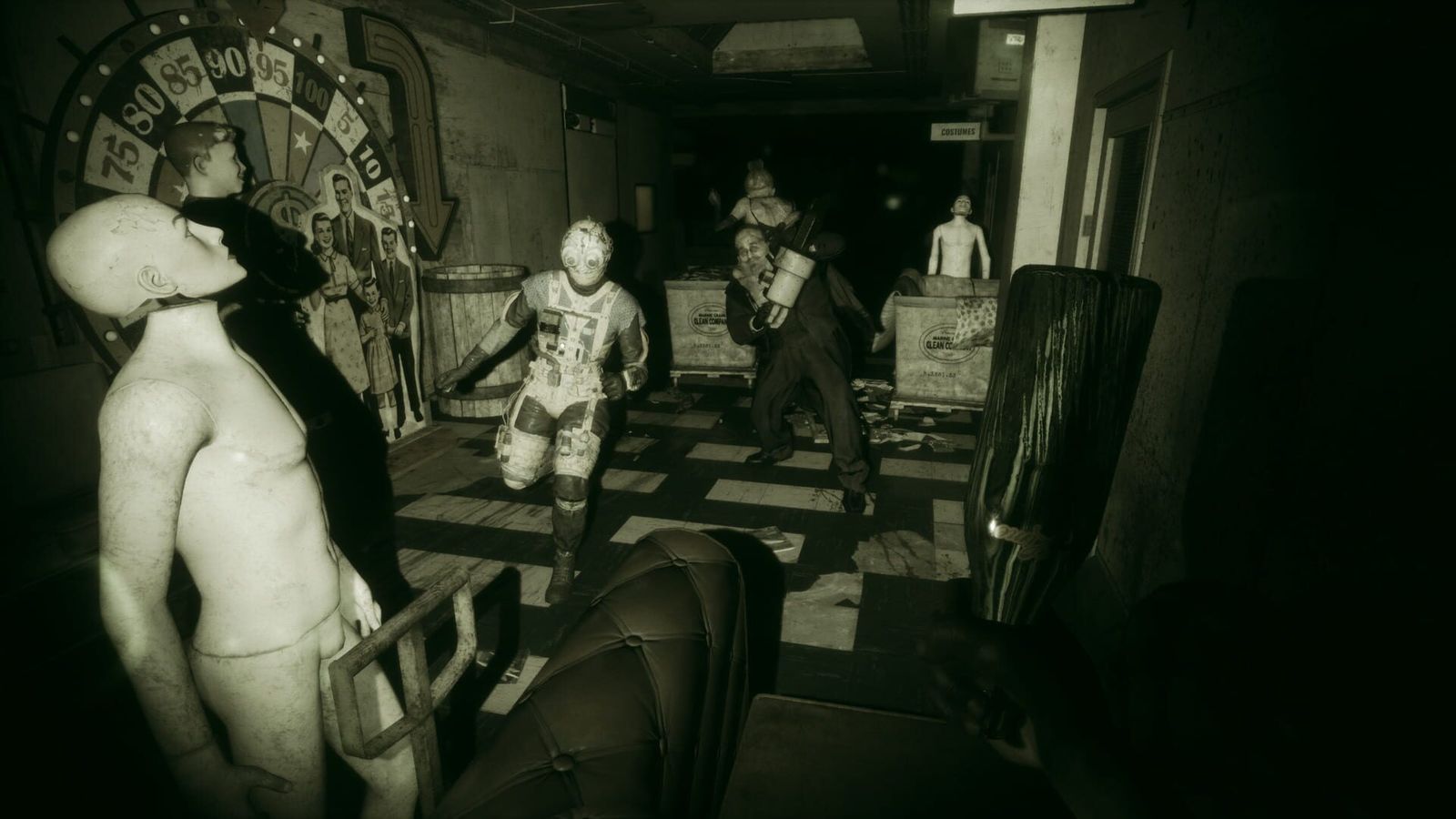 Pale mannequins and masked figures in a dark, green-tinted corridor from The Outlast Trials