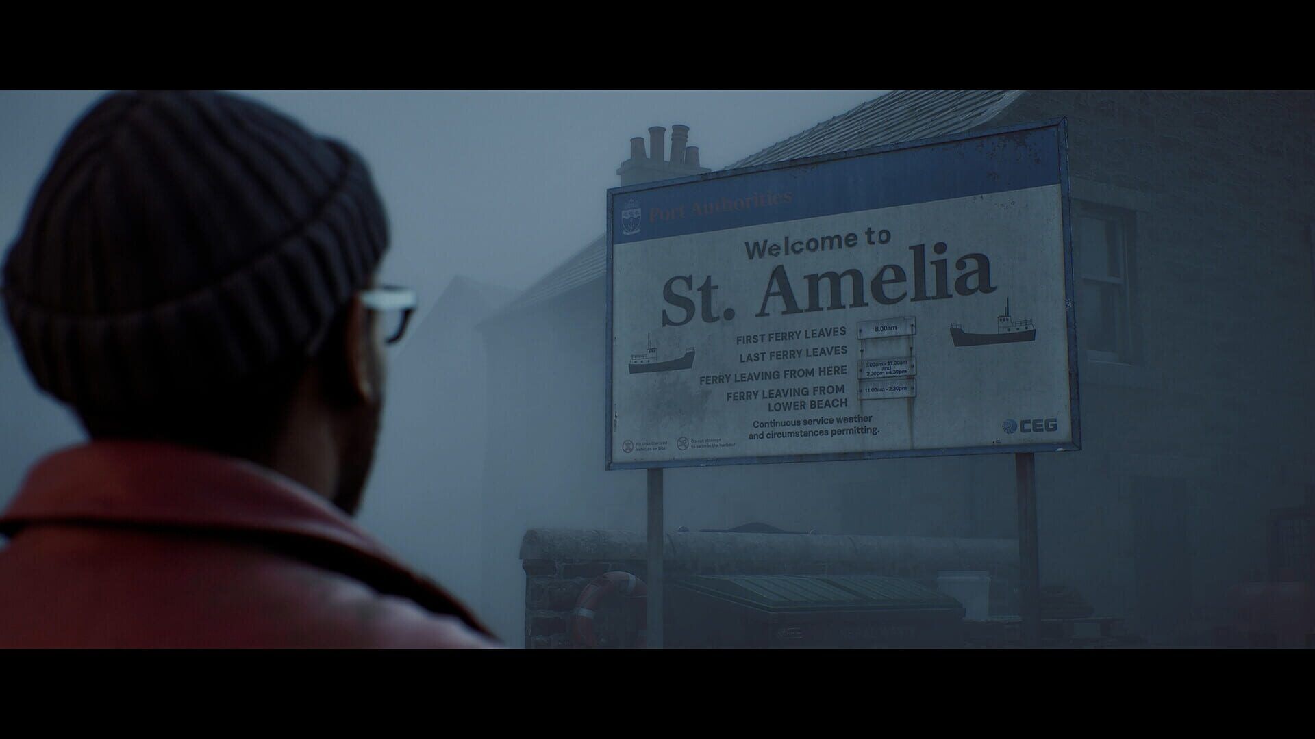 Simon Ordell, seen from behind in a beanie, looks at a 'Welcome to St. Amelia' sign in fog