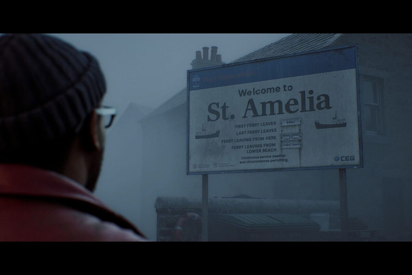 Simon Ordell, seen from behind in a beanie, looks at a 'Welcome to St. Amelia' sign in fog