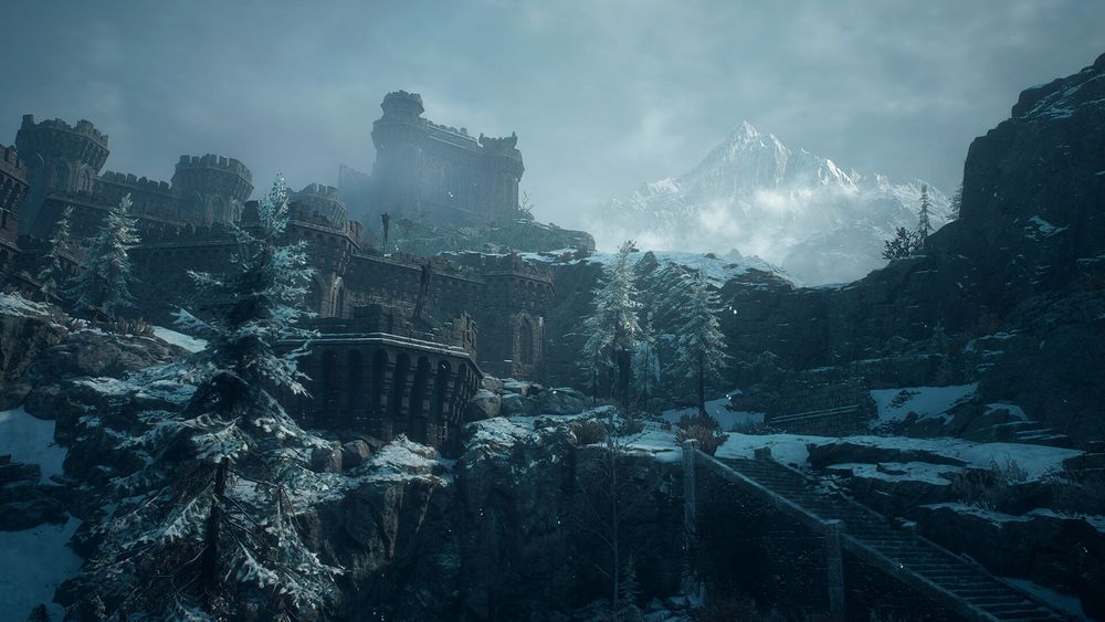 A snow-covered fortress on a cliff with a mountain peak behind it, in the Norgan region of Dragon's Dogma 2: Dark Arisen
