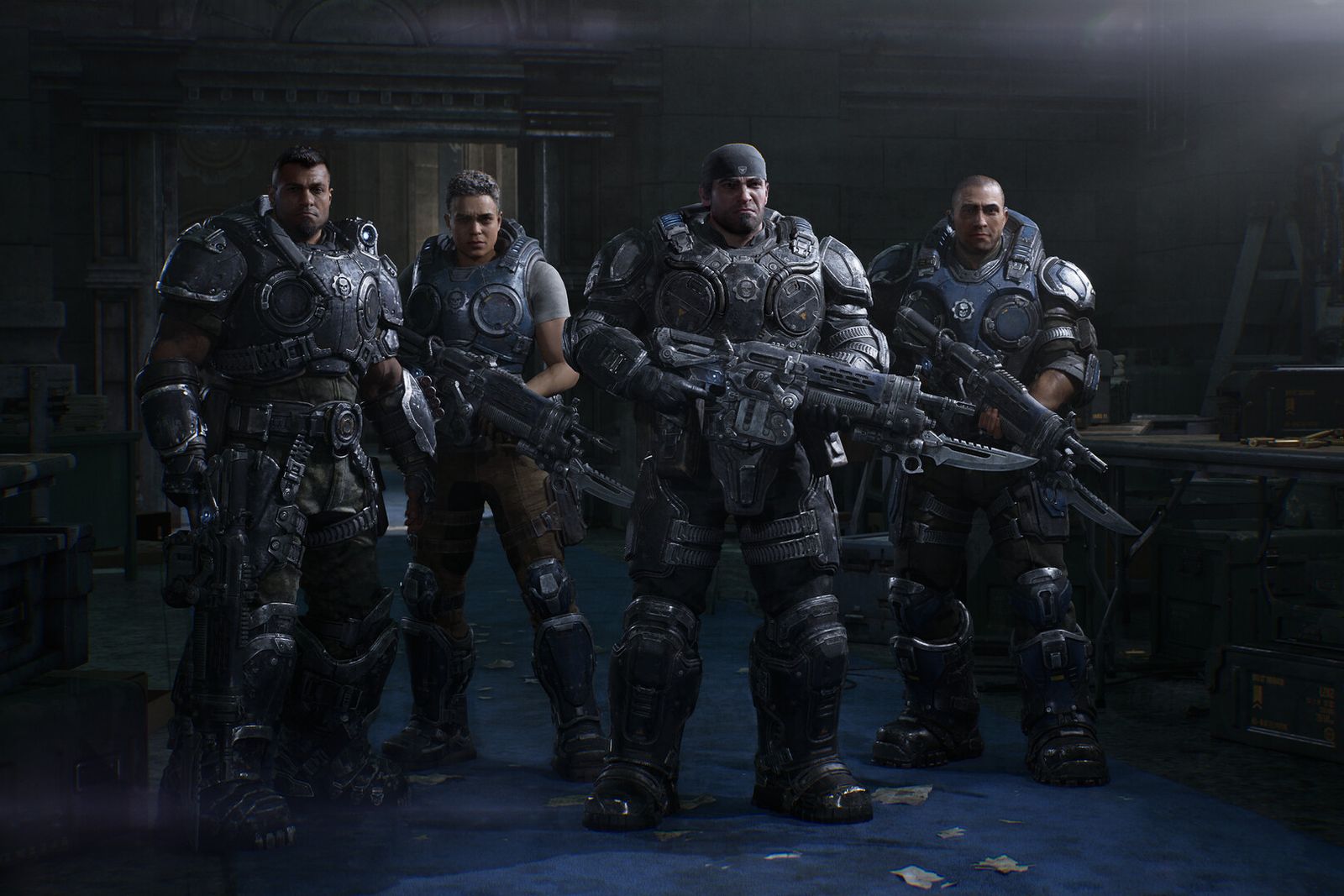 Marcus Fenix, Dom Santiago and two other soldiers of Bravo Squad standing armed in a dim warehouse