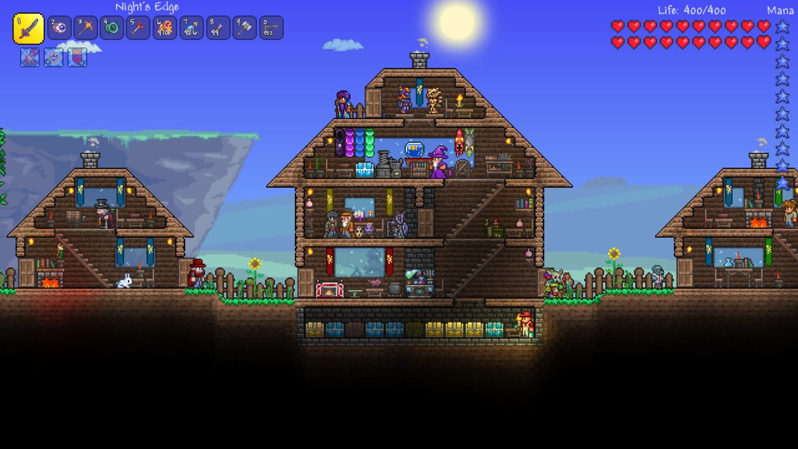 A multi-storey wooden Terraria base with furnished interiors