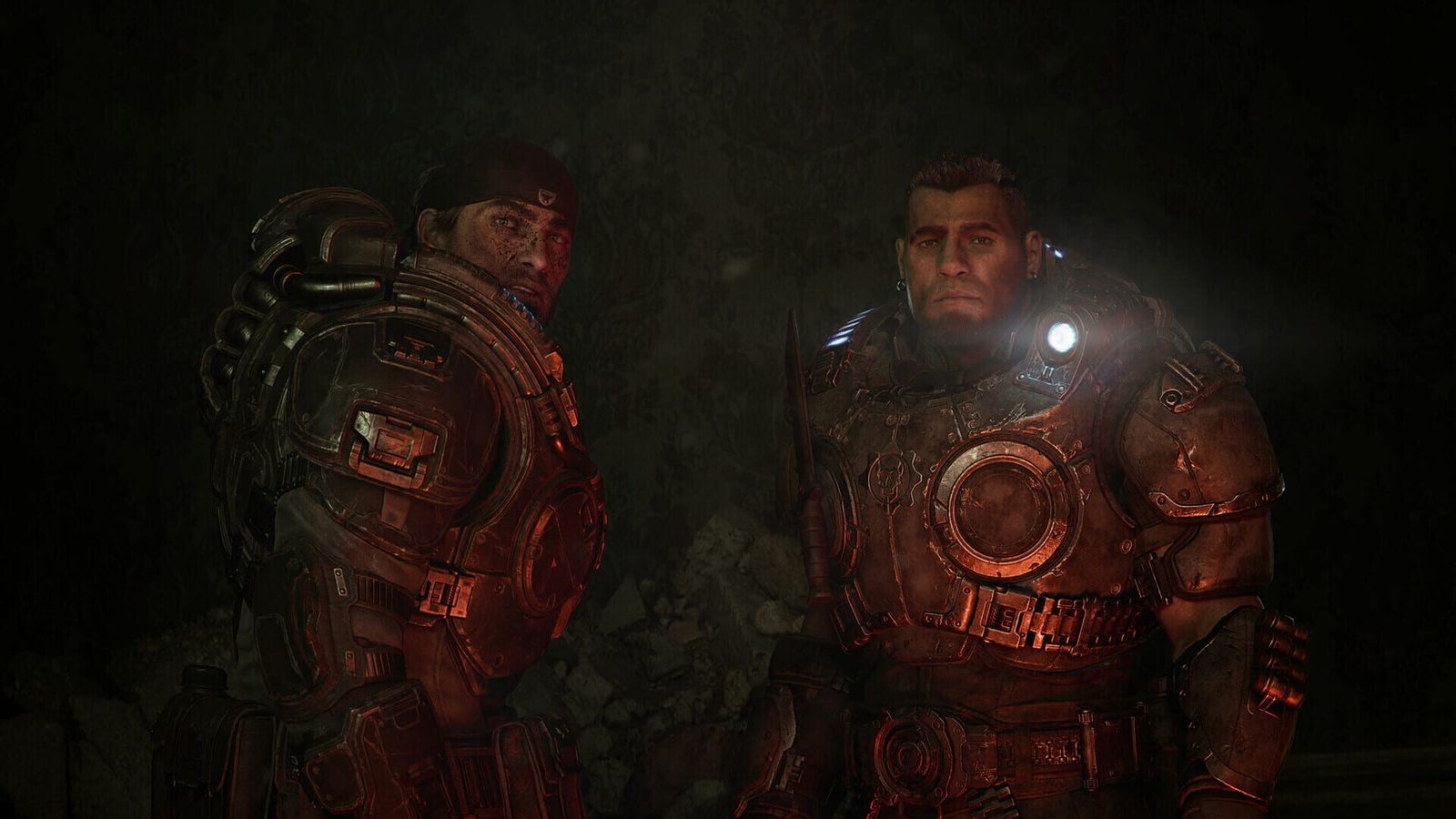 Two COG soldiers in heavy armour stand in a dark tunnel, one with a shoulder lamp switched on