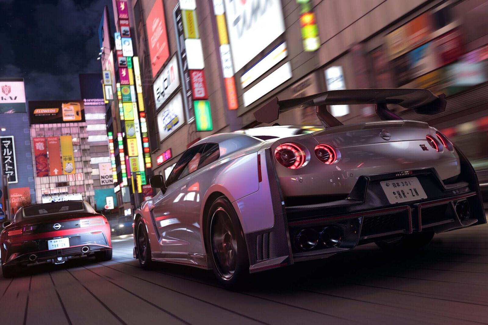 Silver GT-R racing down a neon-lit Tokyo street at night
