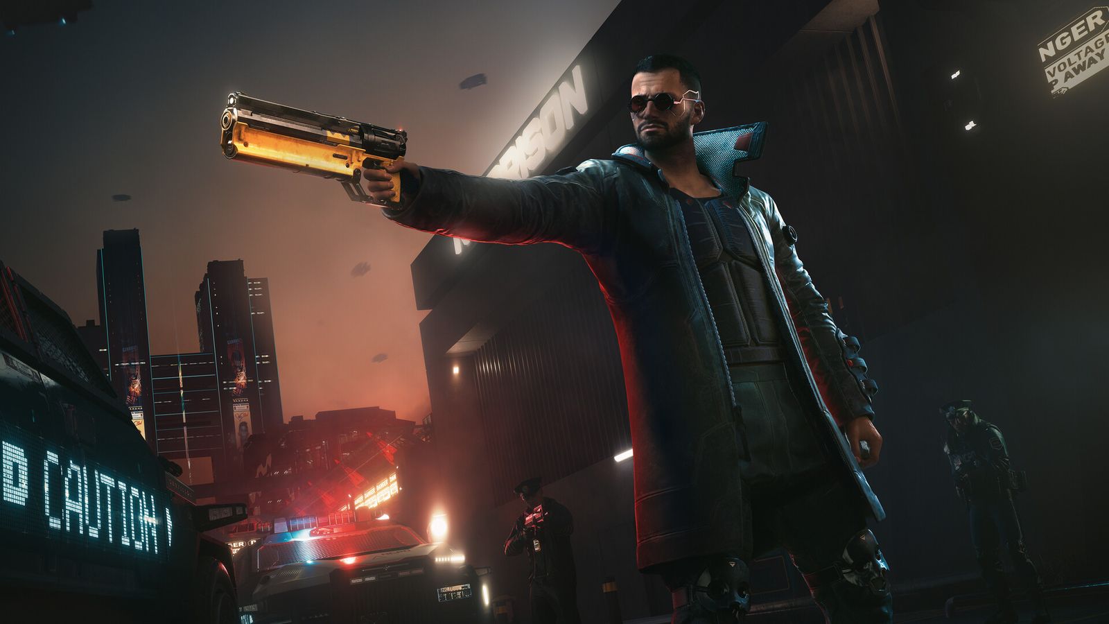 V in a long coat aiming a pistol on a Night City street at night with police cars behind