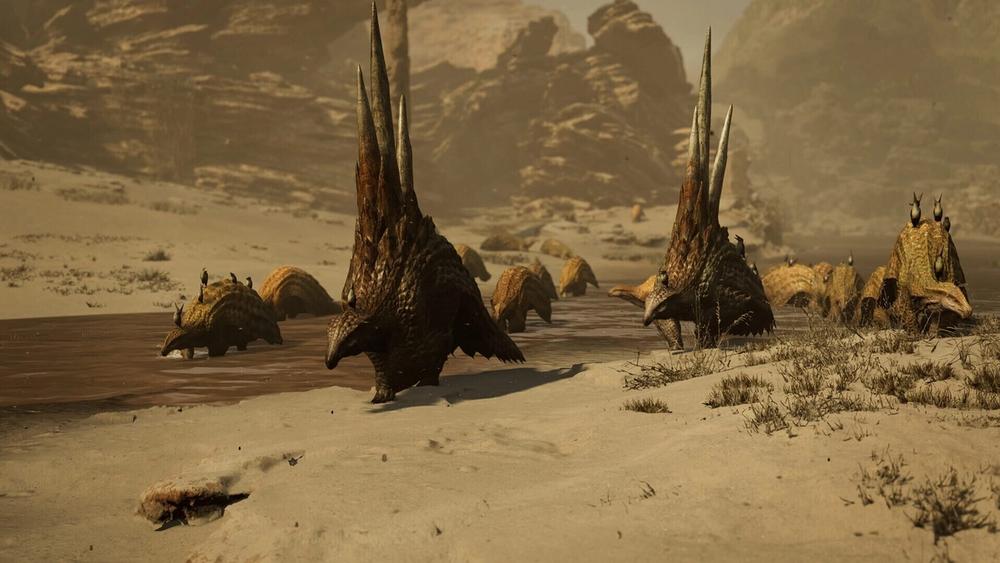 Two spined monsters walking across the sand with their herd behind them