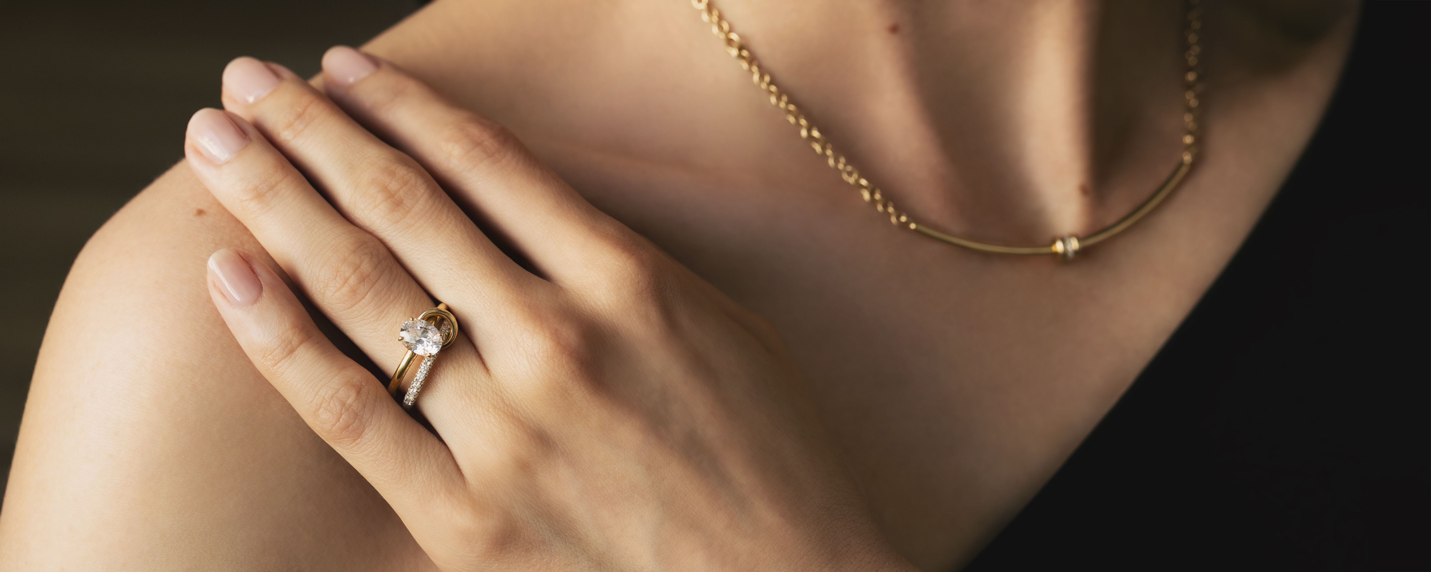 Spinelli Kilcollin wedding and engagement linked ring jewelry in 18k yellow gold on model