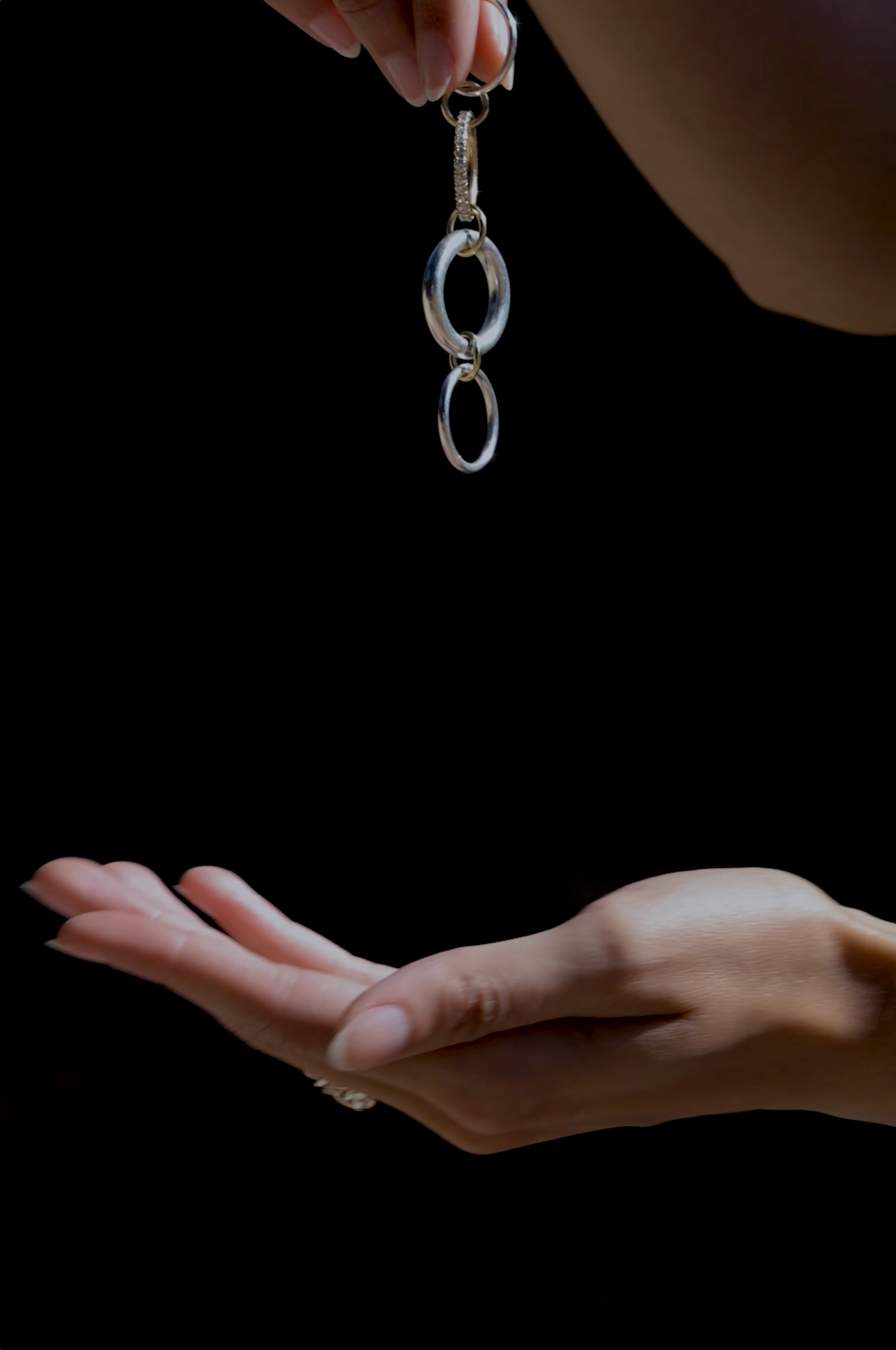 An image of a model wearing a Spinelli Kilcollin ring