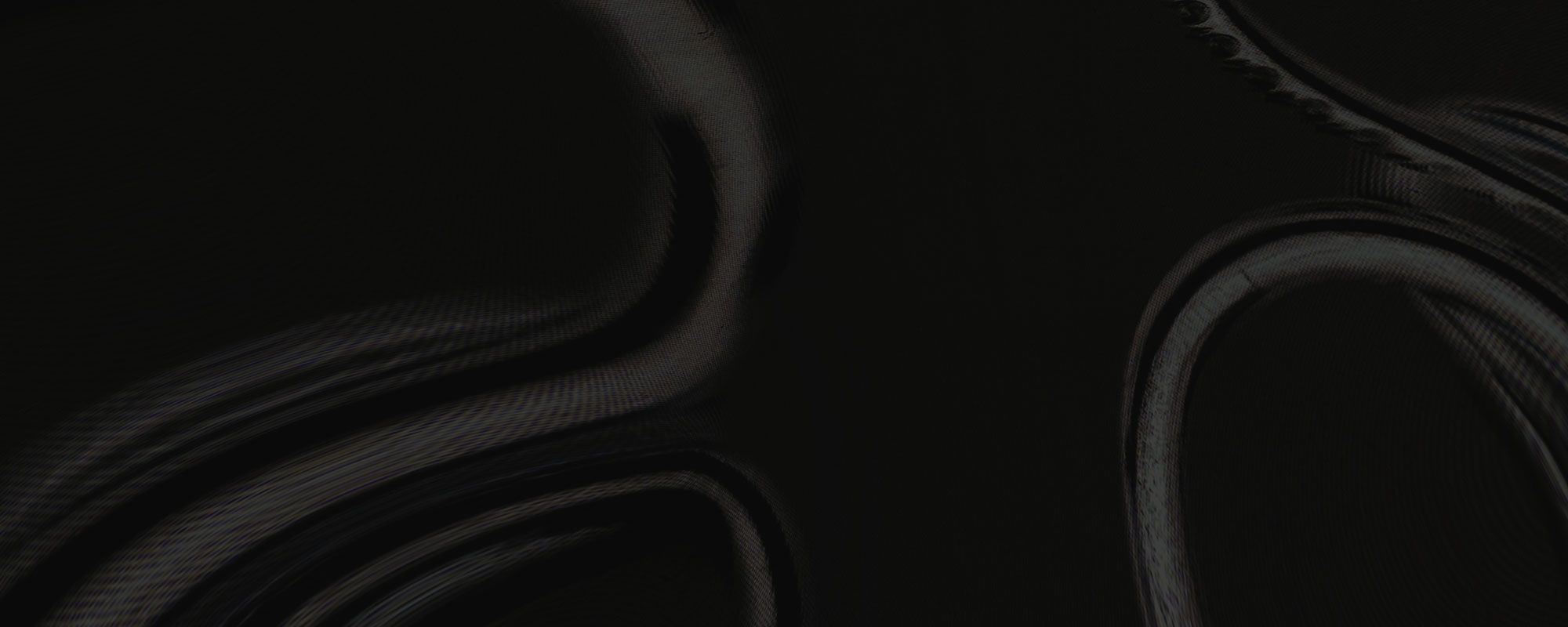 Spinelli Kilcollin warped rings on inverted dark background