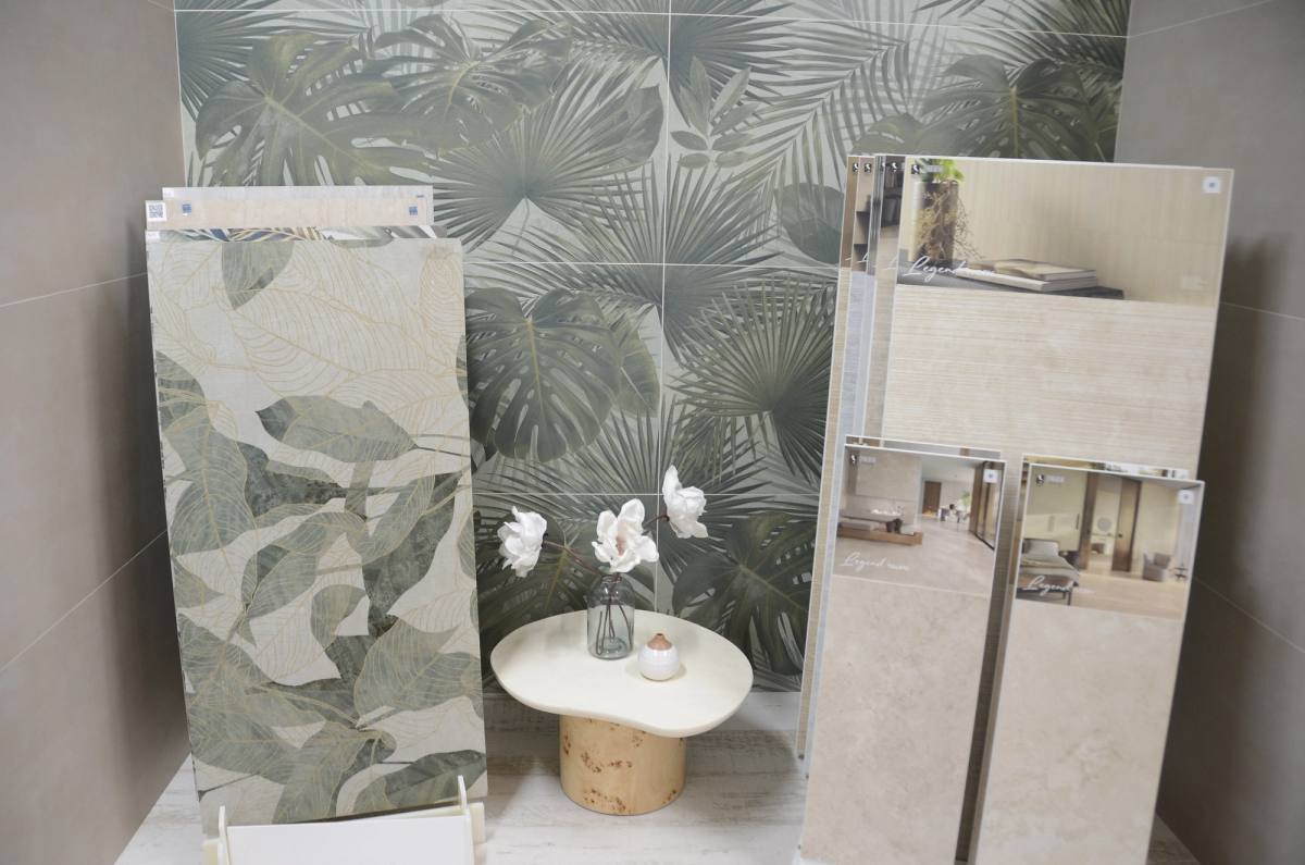 Botanical-print porcelain panels set up as a vignette on the showroom floor