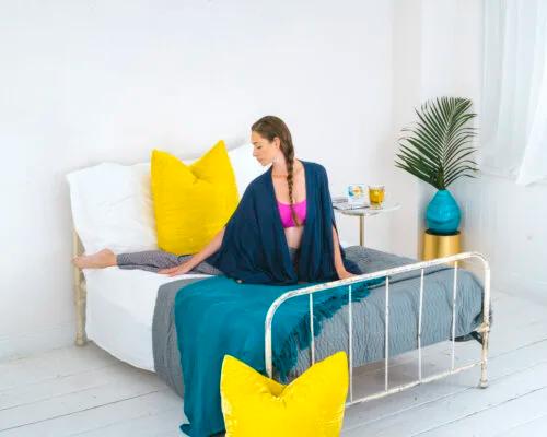 How to Do Yoga (in Bed!) for Better Sleep
