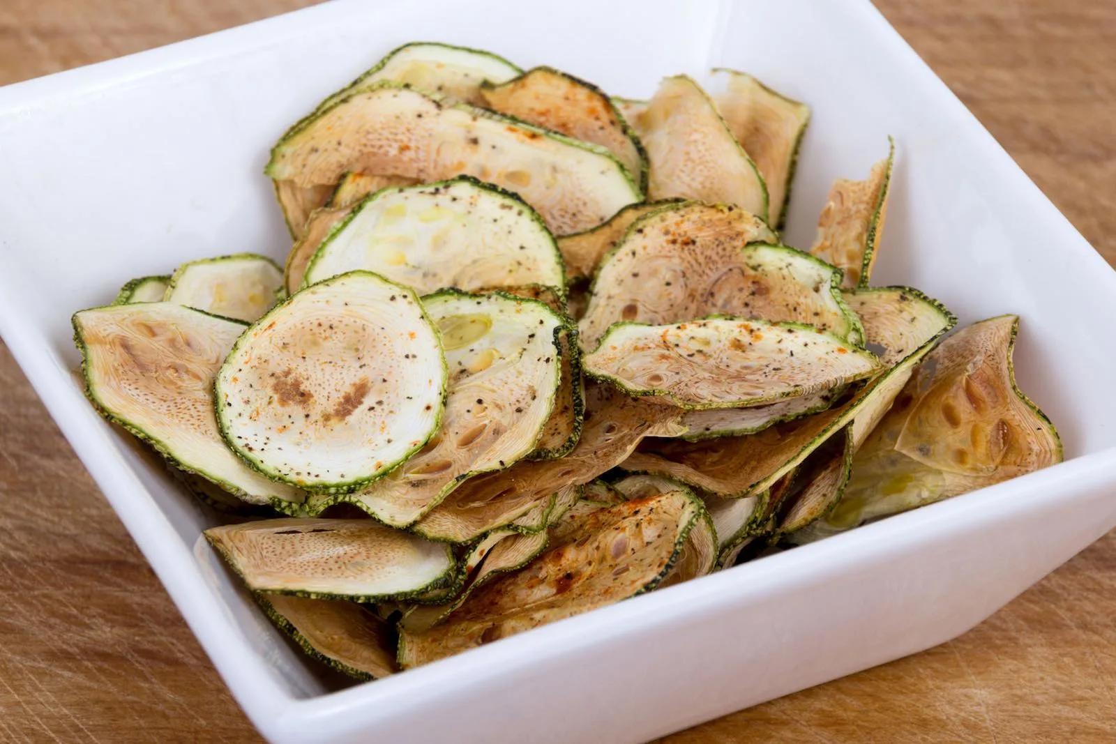 Crispy baked zucchini chips made with simple ingredients — a healthy, crave-worthy alternative to fried snacks.
