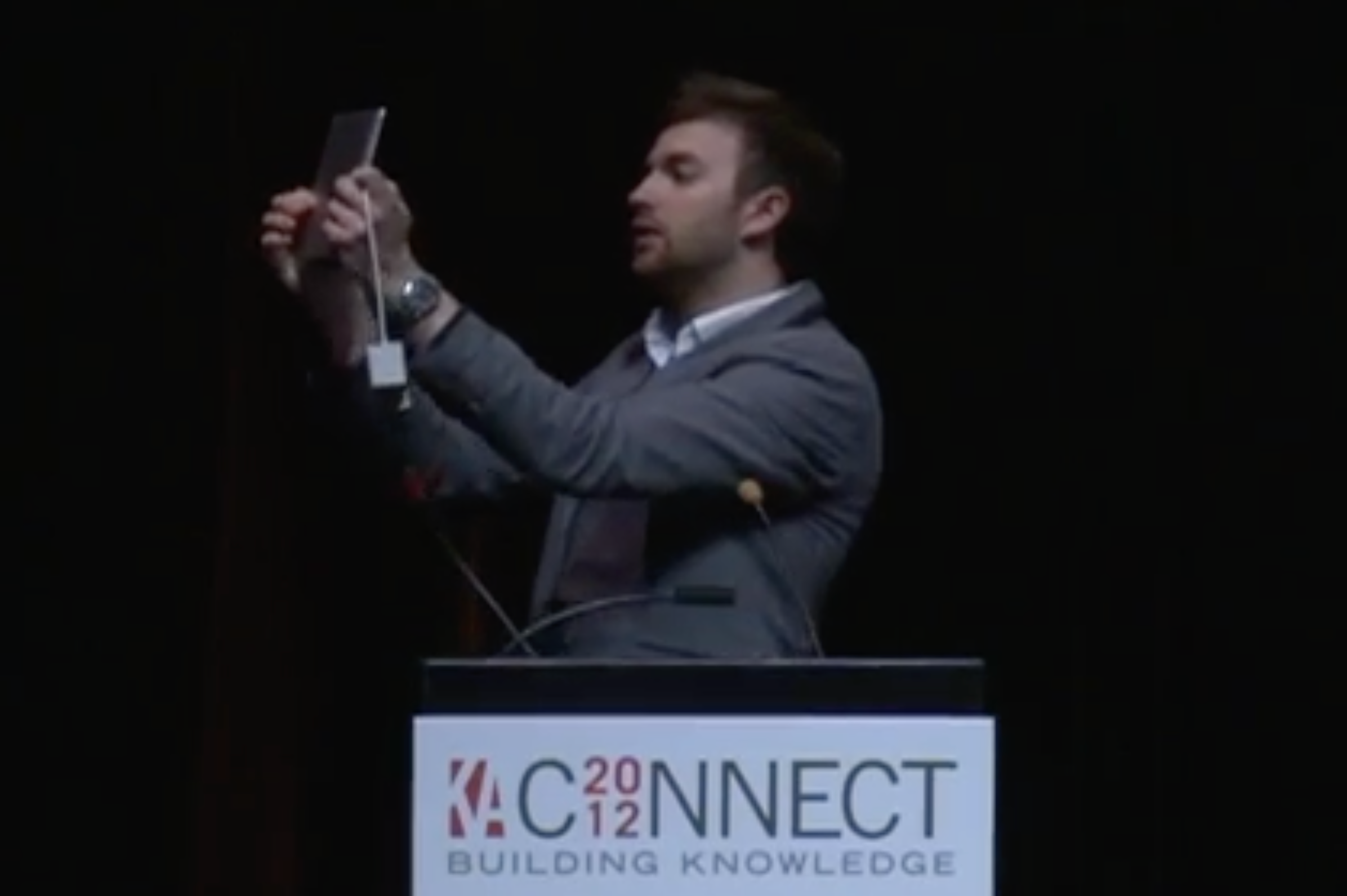 Andrew holding an iPad