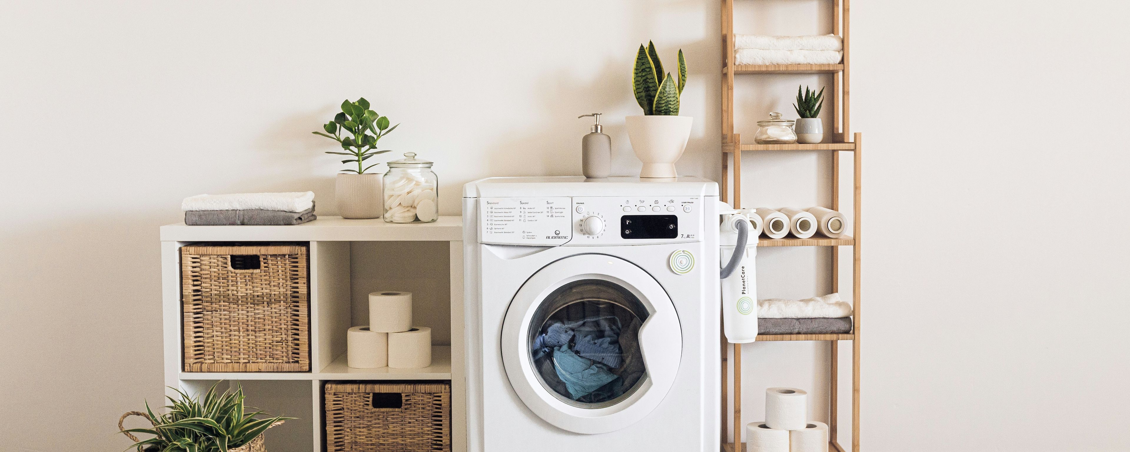 laundry room with washing machine and shelves