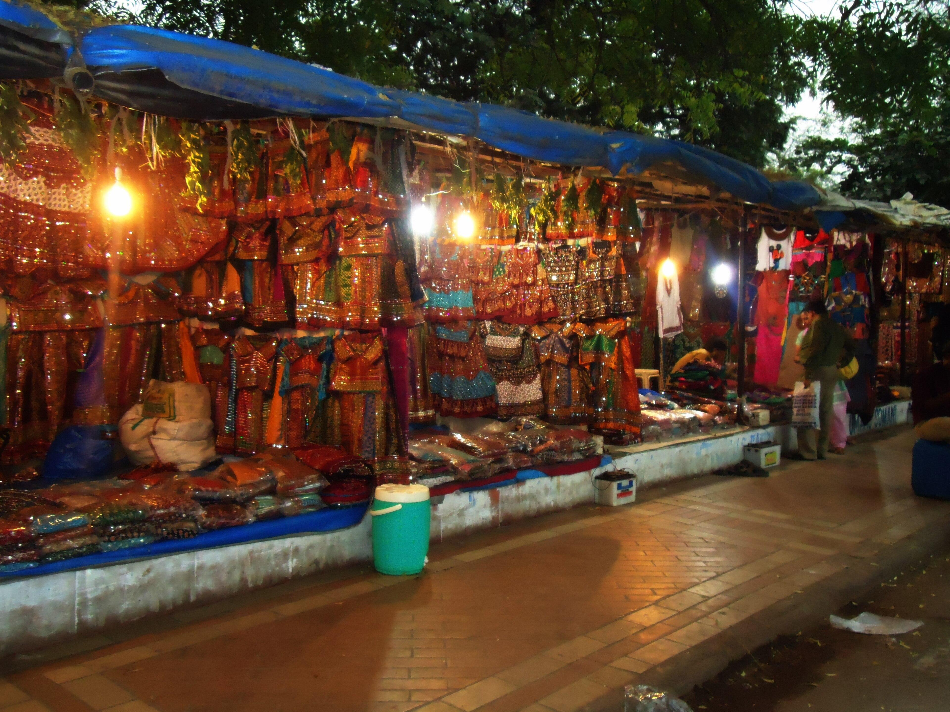 Chaniya choli stalls lit up in the evening near Law Garden, Ahmedabad