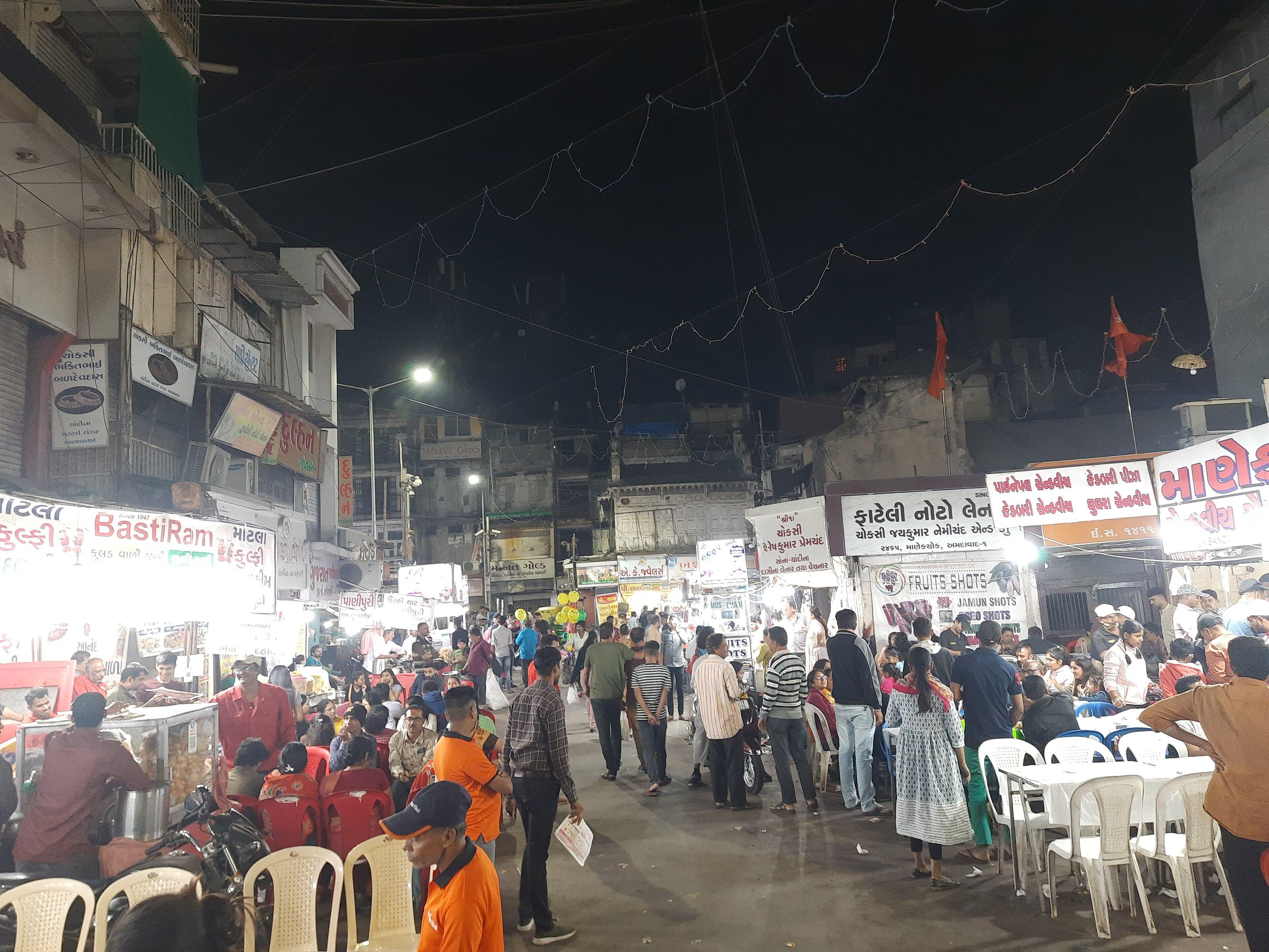 Manek Chowk at night, when food stalls take over the square
