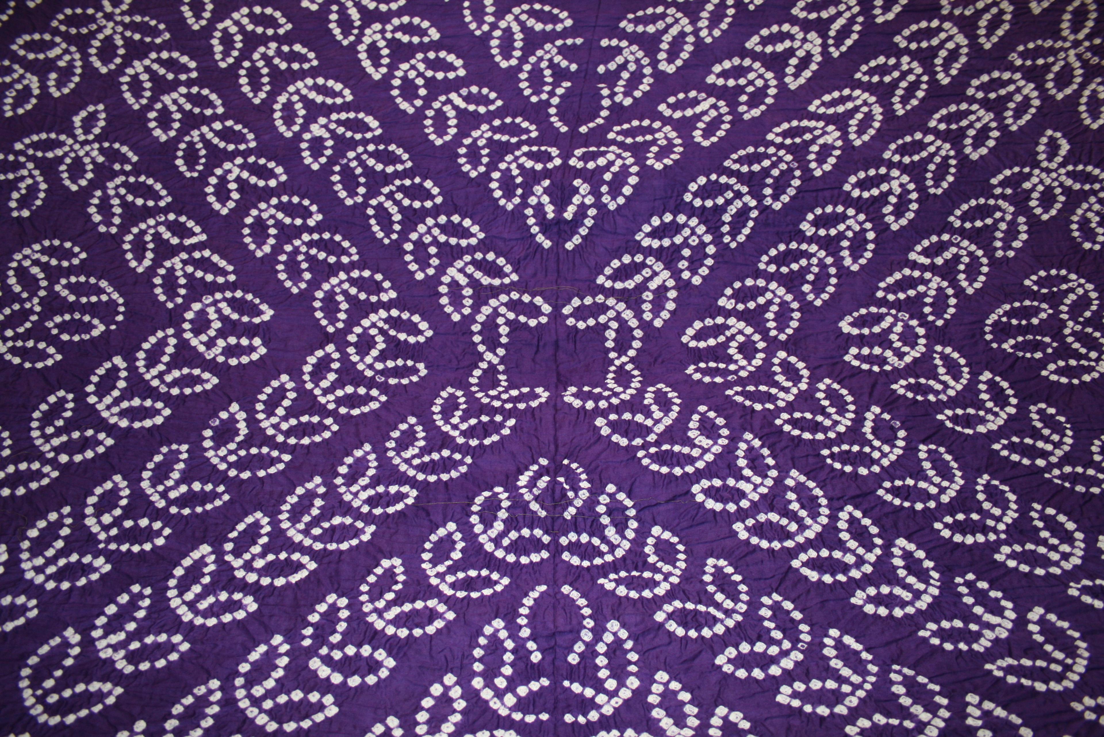 Purple bandhani with white tie-dyed dot patterns
