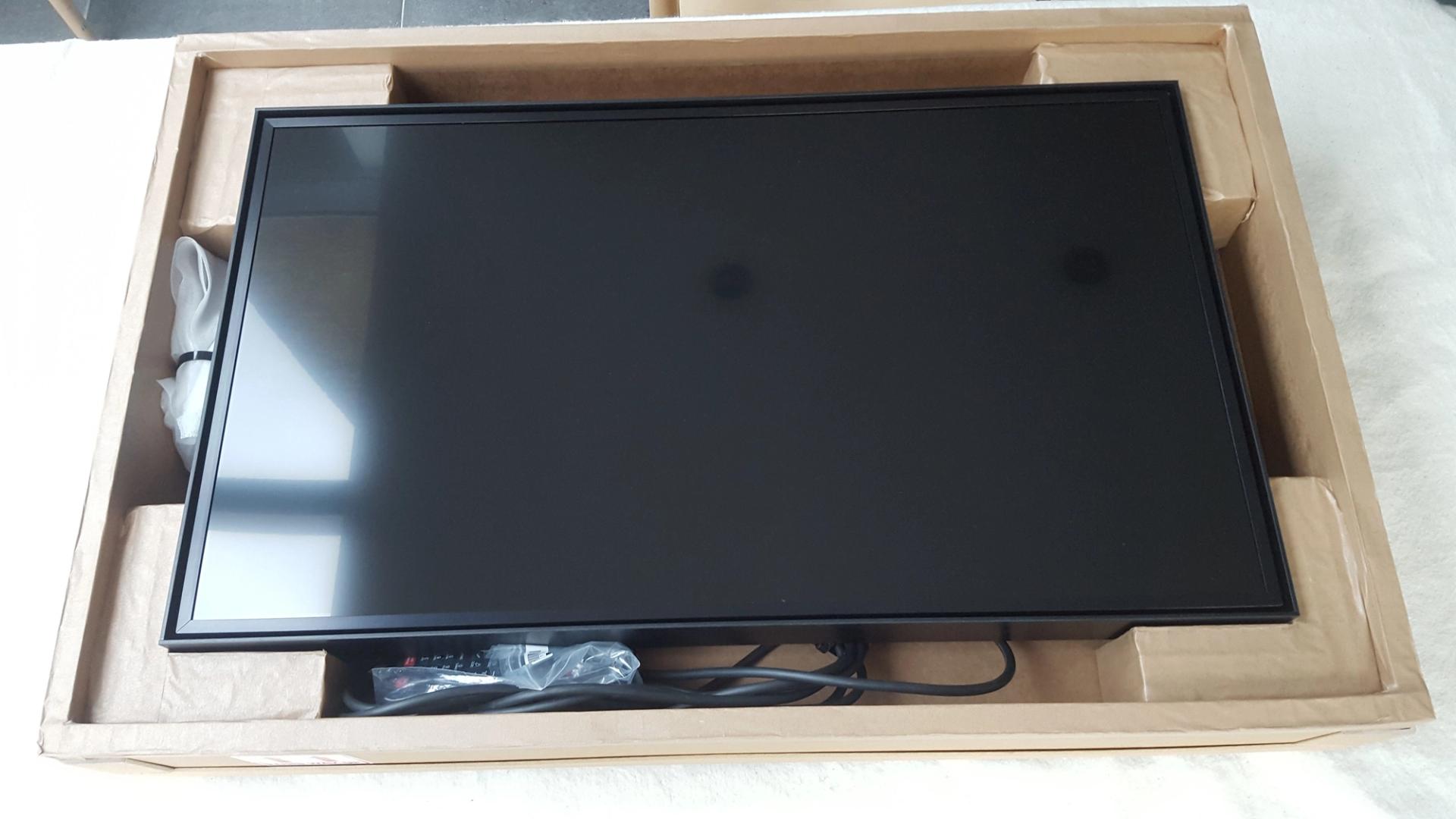 32" screen in packing crate