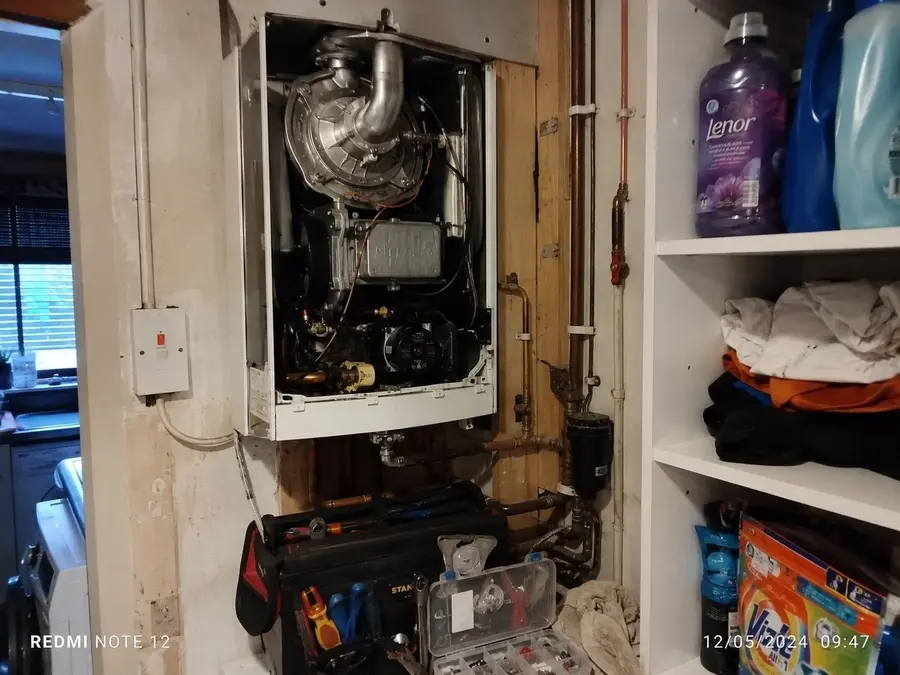 Boiler internal components and pipework inspected during a service by R.W. Miller Plumbing & Heating, South London