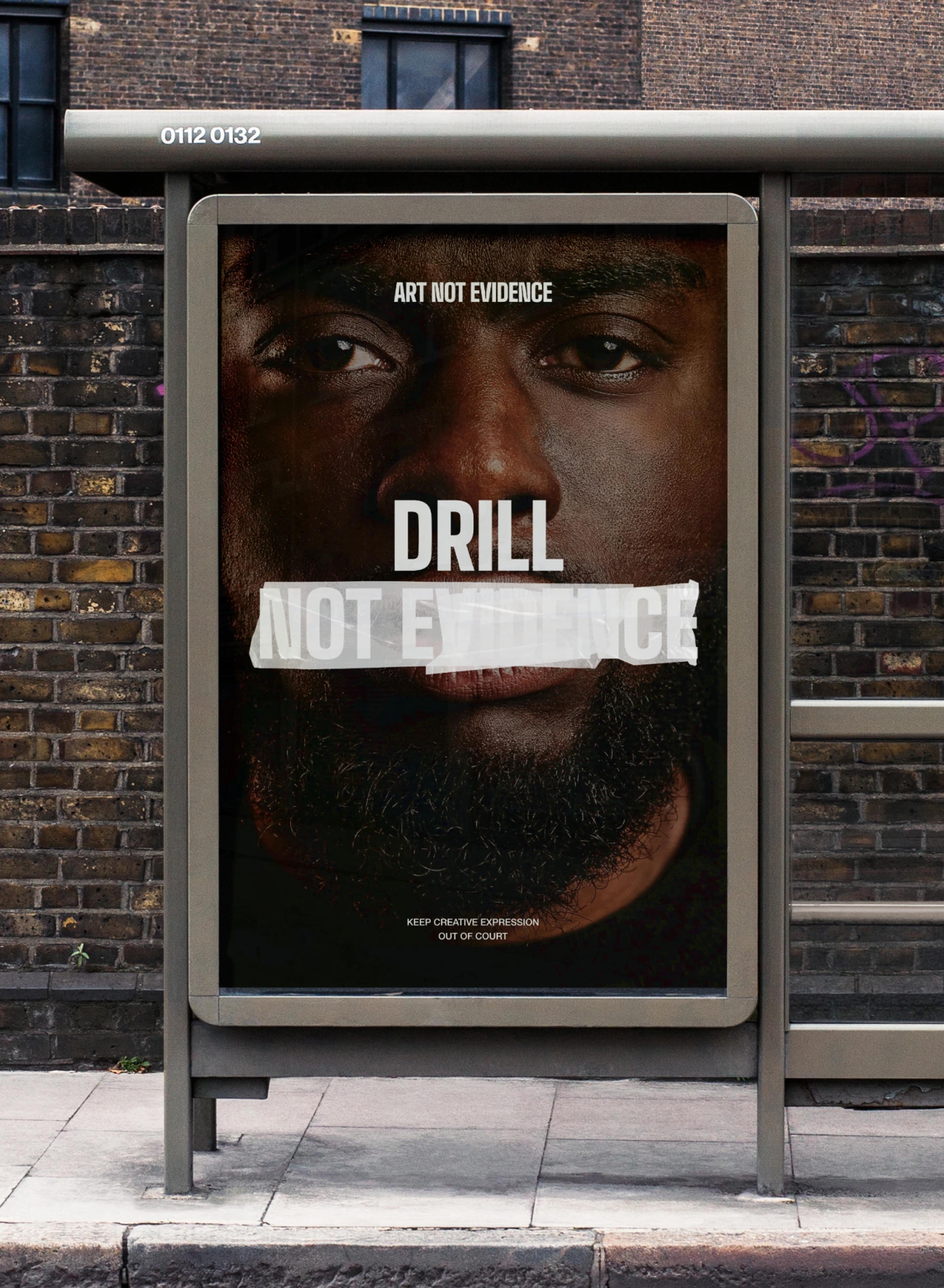 Bus stop ad with "Drill Not Evidence"