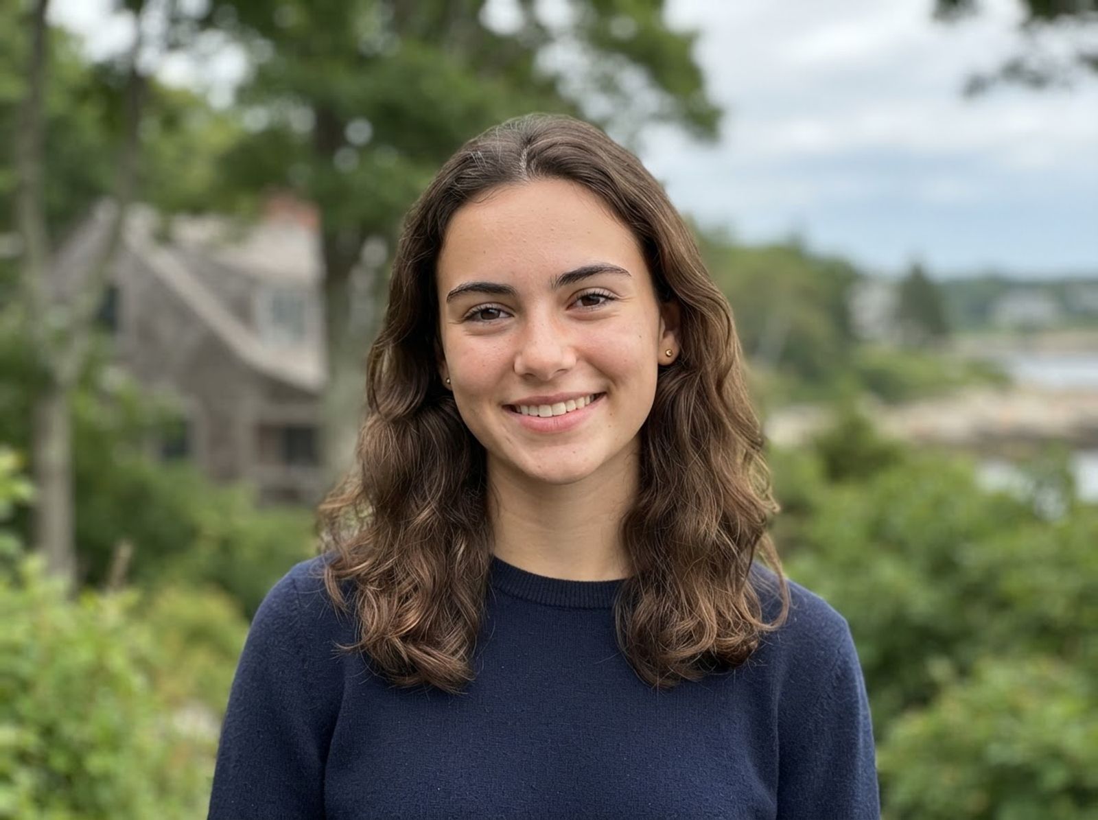 Profile photo of Aliyah M., an example sitter, smiling outdoors