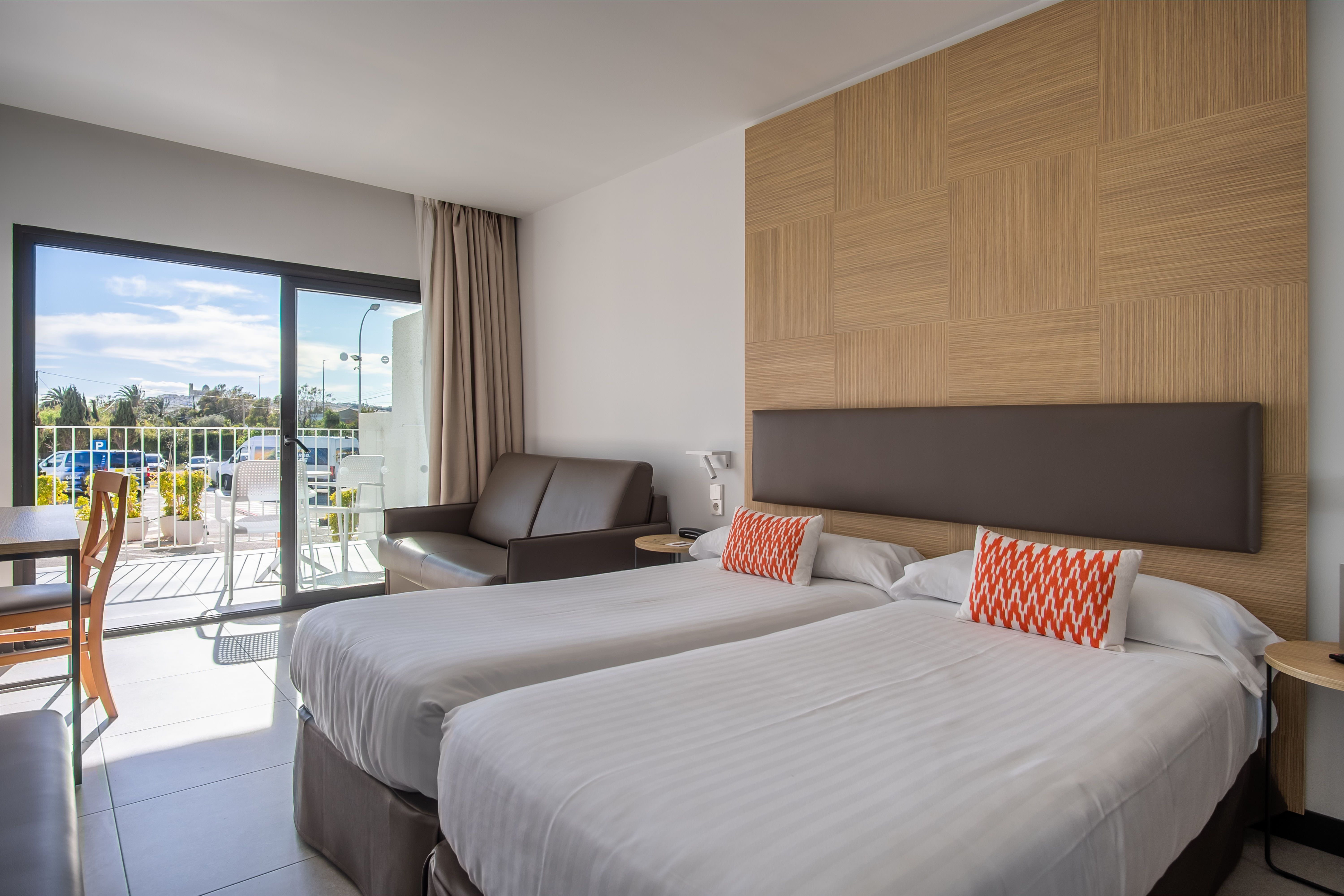 Hotellrommene har 2 store enkeltsenger