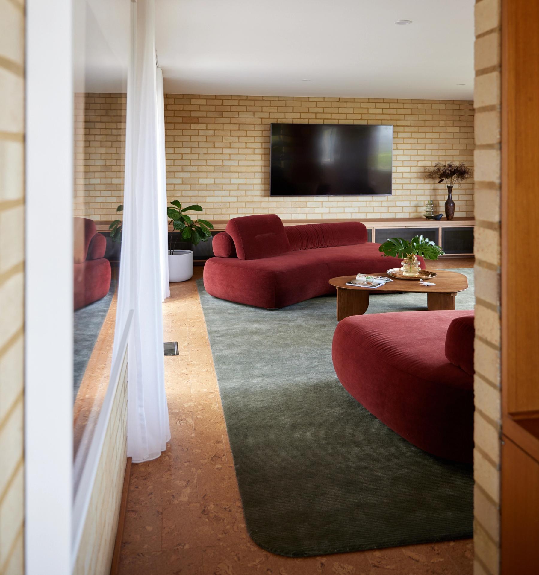 Custom sofas and wooden cabinetry 