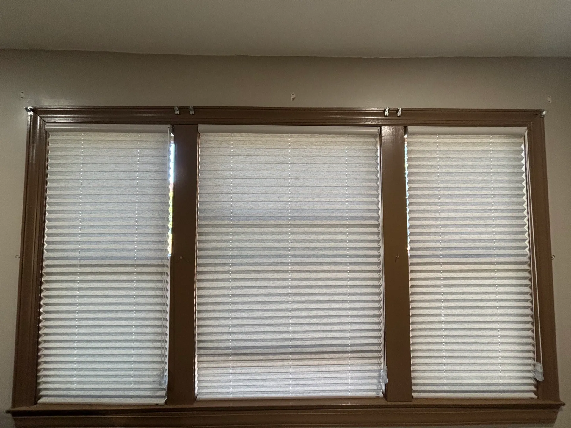 Recently installed window treatments by Instant Shade