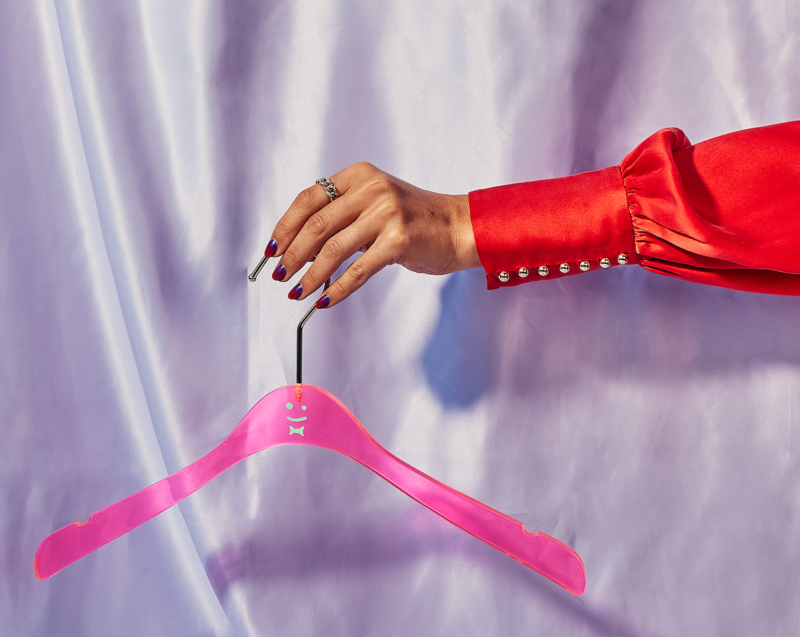 Pink hanger with hand
