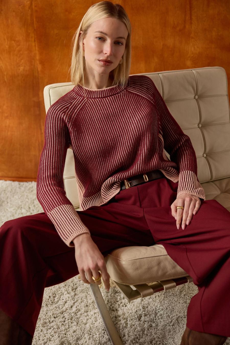 Model wearing a ribbed knit dress