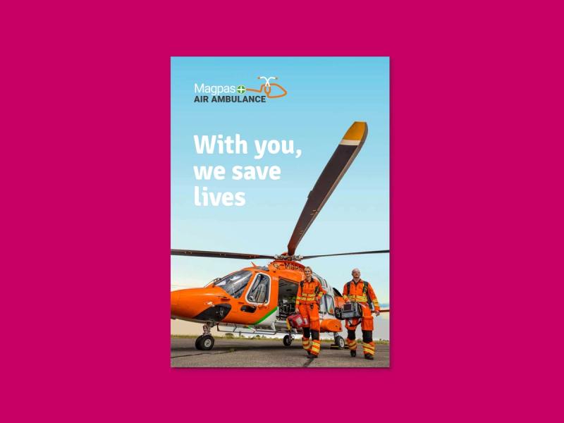 Magpas Air Ambulance fundraising campaign folder front with the caption "With you, we save lives".