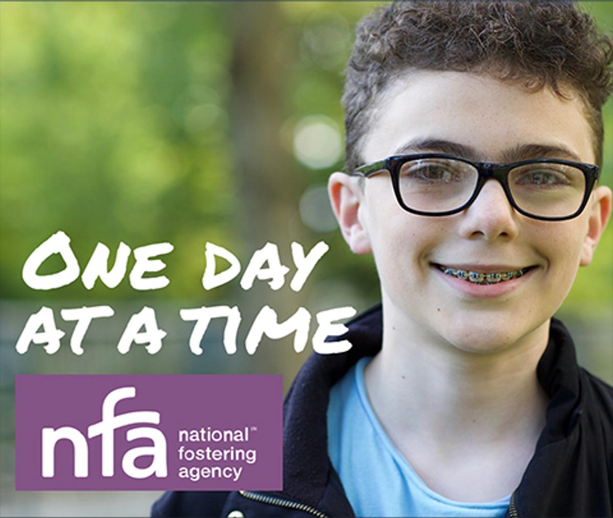 National Fostering Agency campaign web advert frame showing a colour image of a smiling young boy with the caption "One day at a time".
