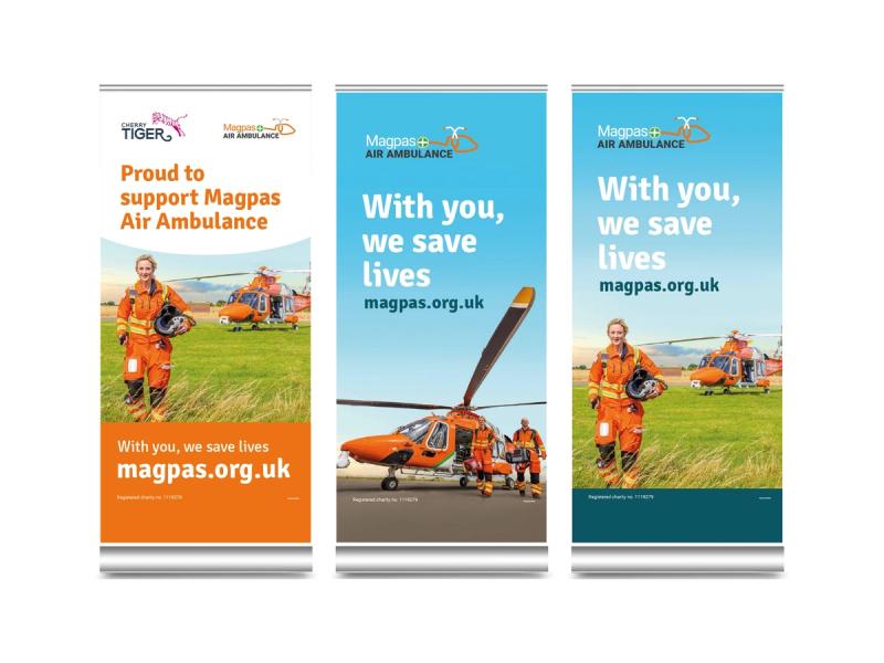 Magpas Air Ambulance fundraising campaign, three pull up banner mockups showing various designs and captons.