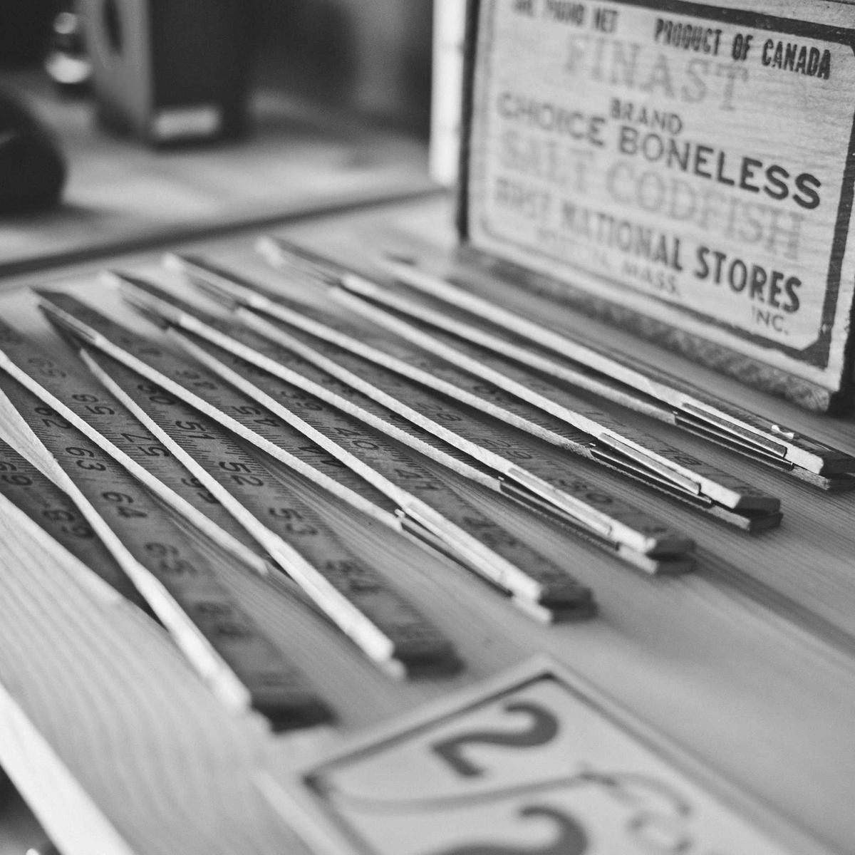 Selection of titanium piercing jewelry on a black tray