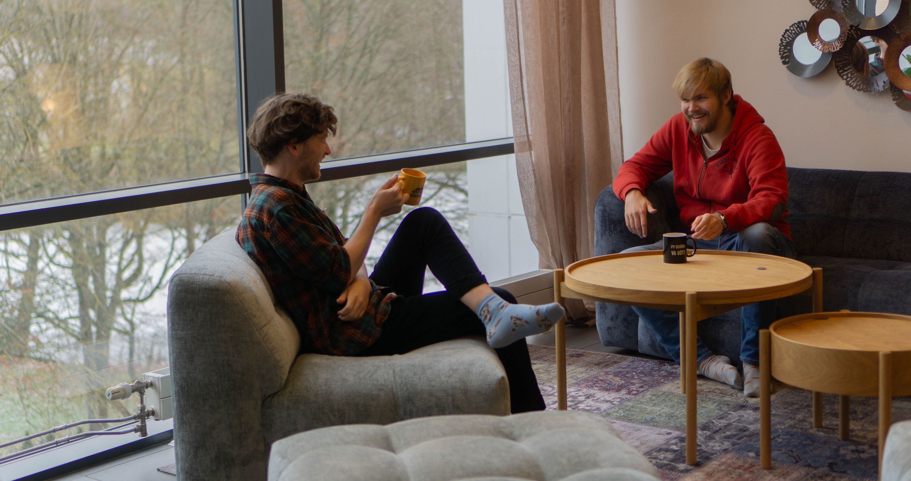 Image depicting two employees in an office space