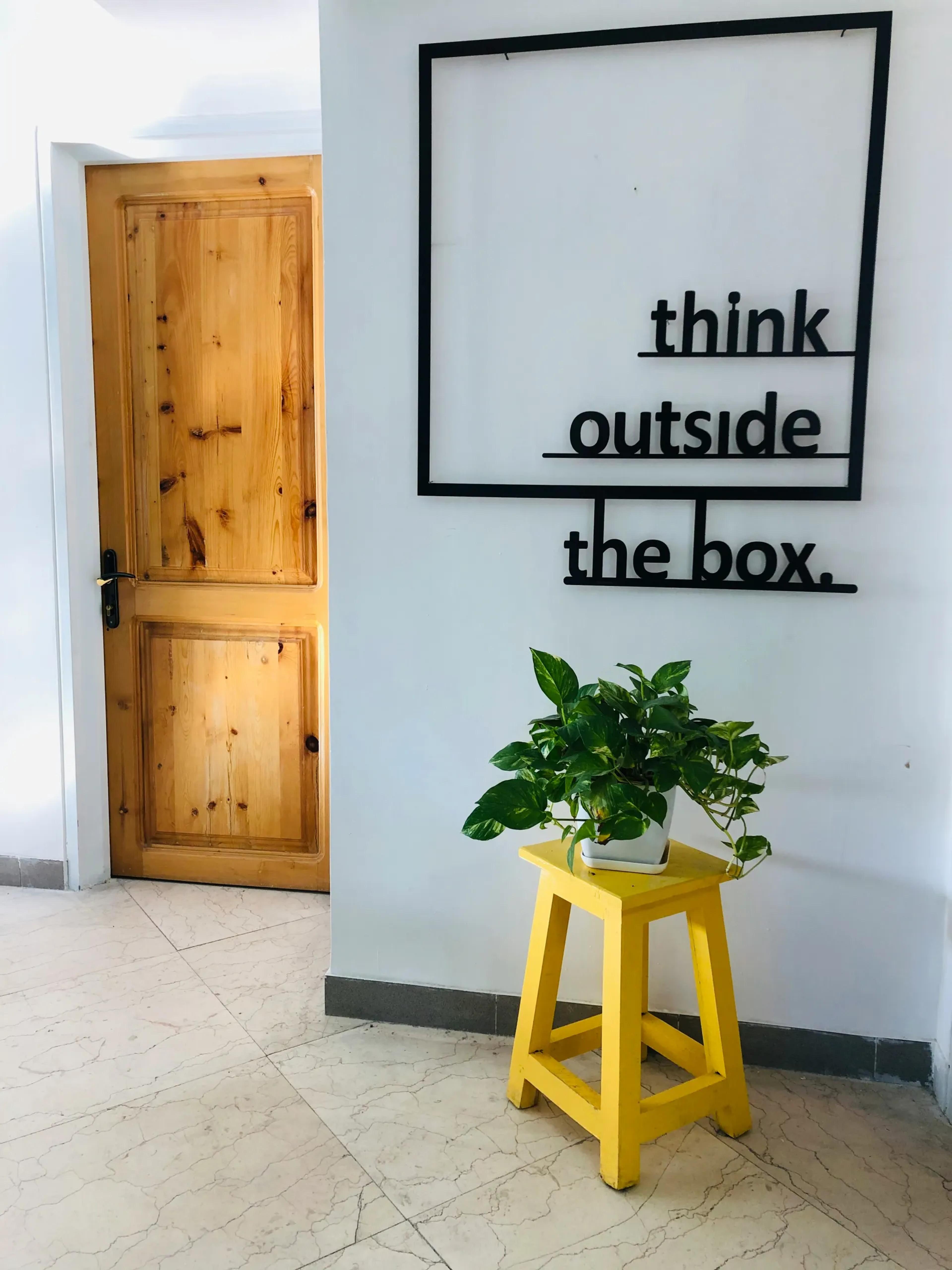 Image of a sign that says think outside the box.
