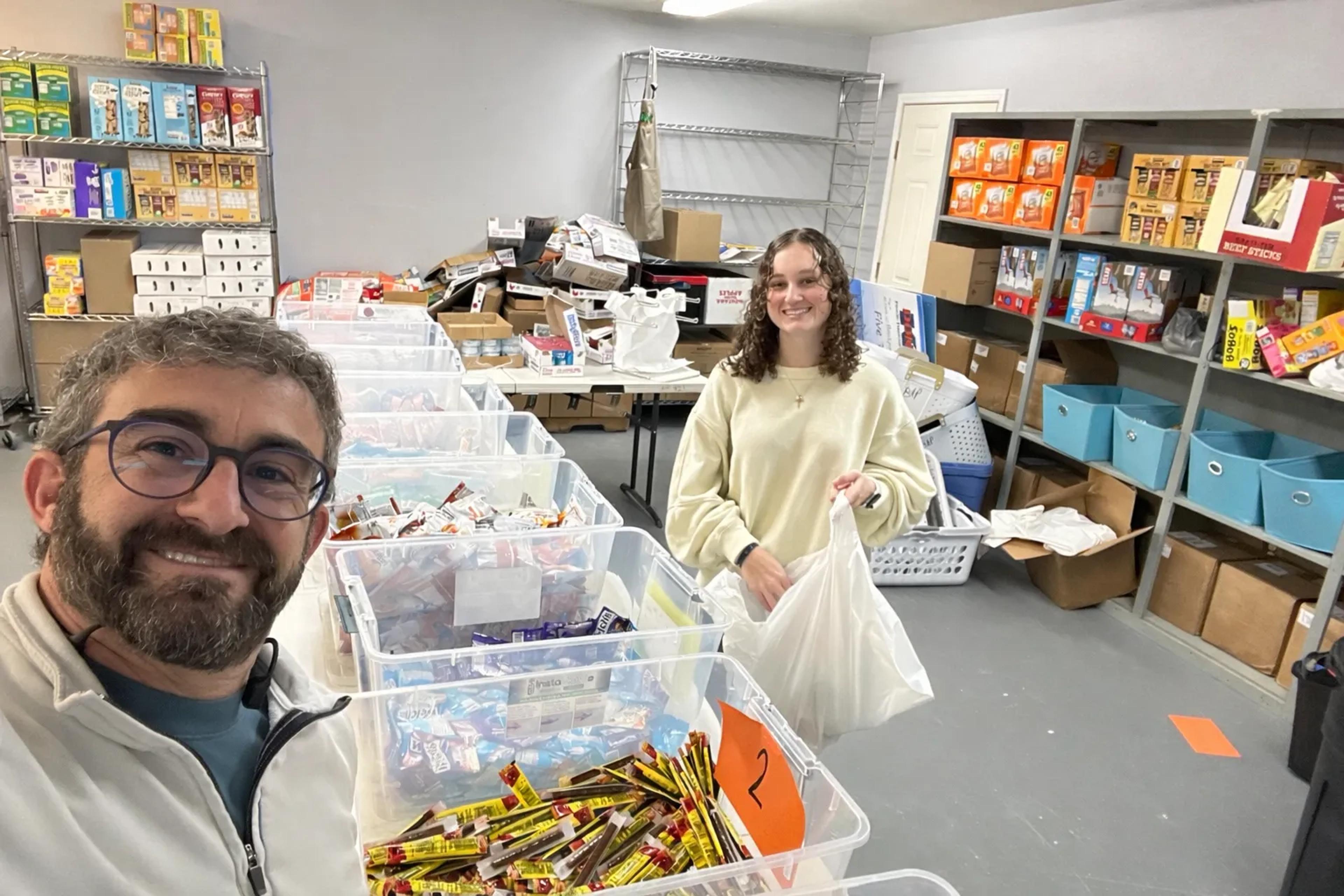 Michael and his daughter at a nonprofit