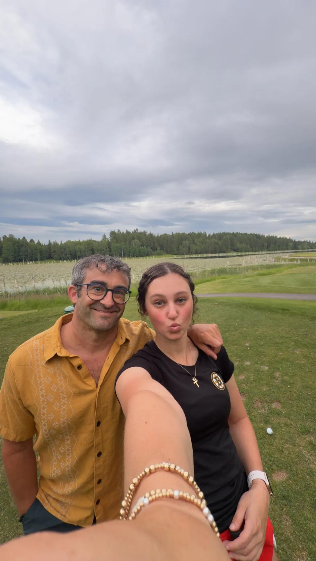 Micheal and his daughter taking a selfie