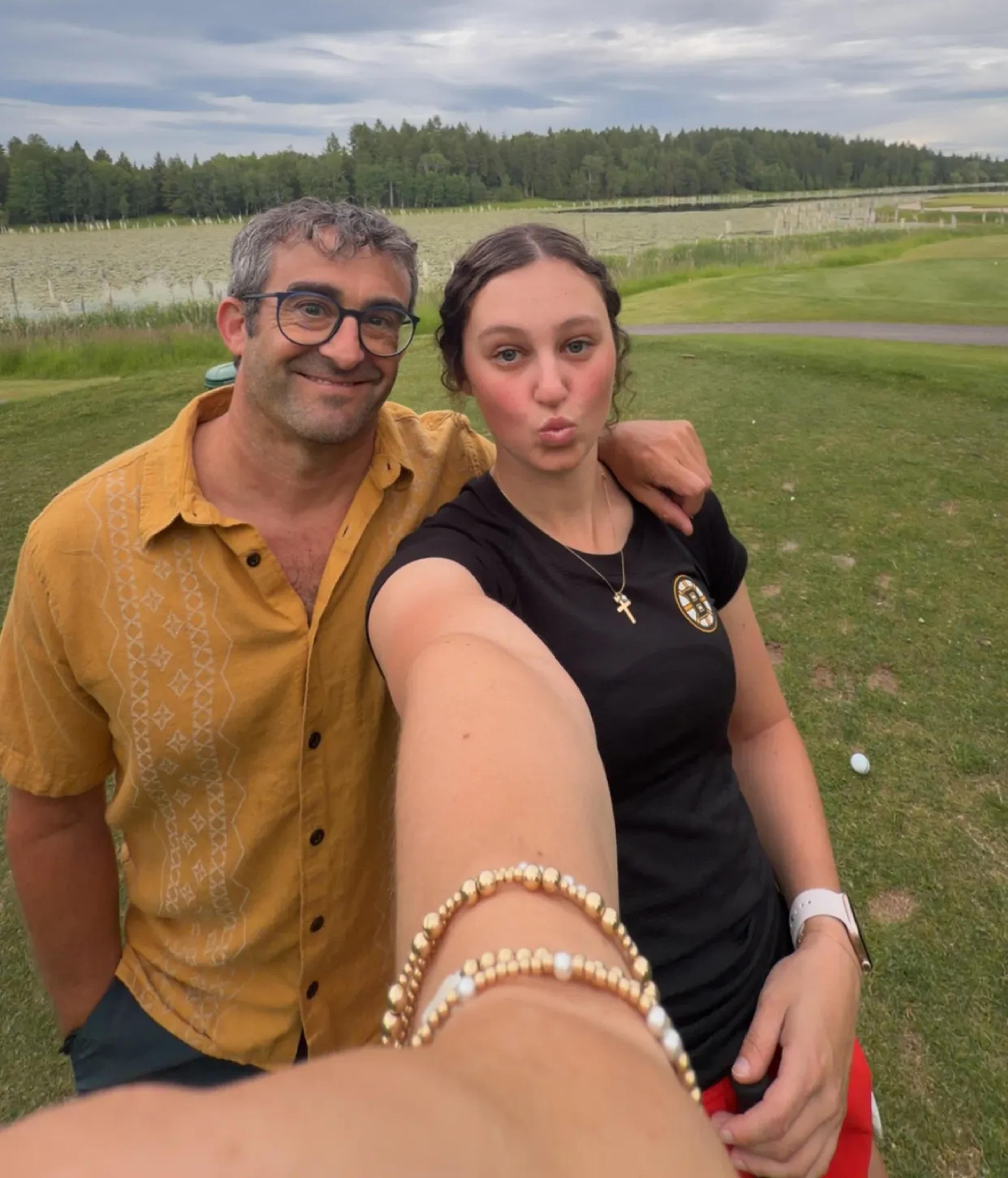 Micheal and his daughter taking a selfie