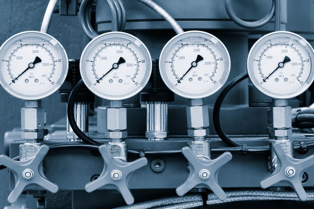 A macro photograph of a synchronized industrial gauge and valve stack, representing the transition from informal AI use to a sanctioned, governance-grade architecture.