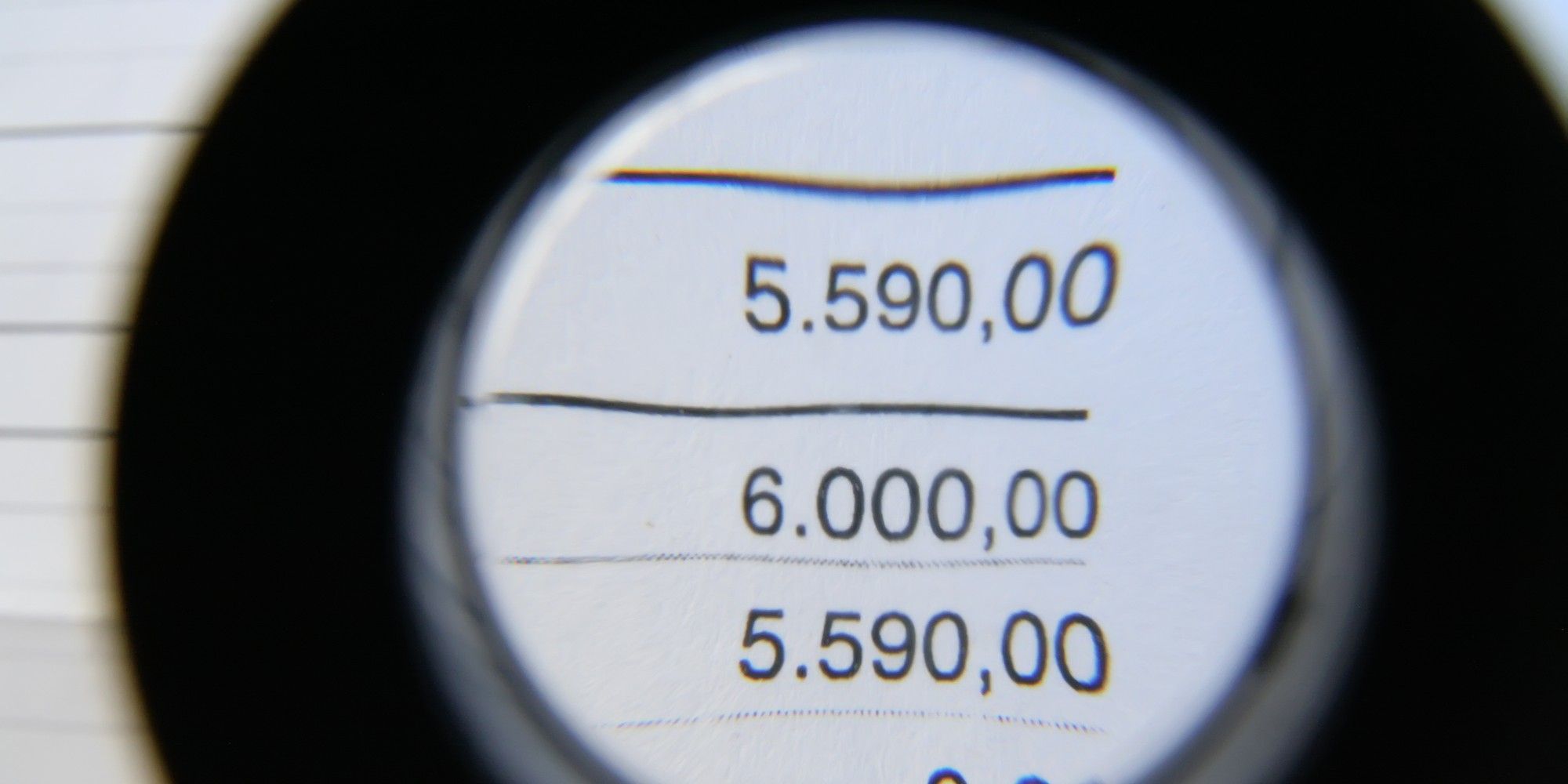 A magnifying glass held over a ruled ledger, standing for scrutiny of AI visibility metrics.