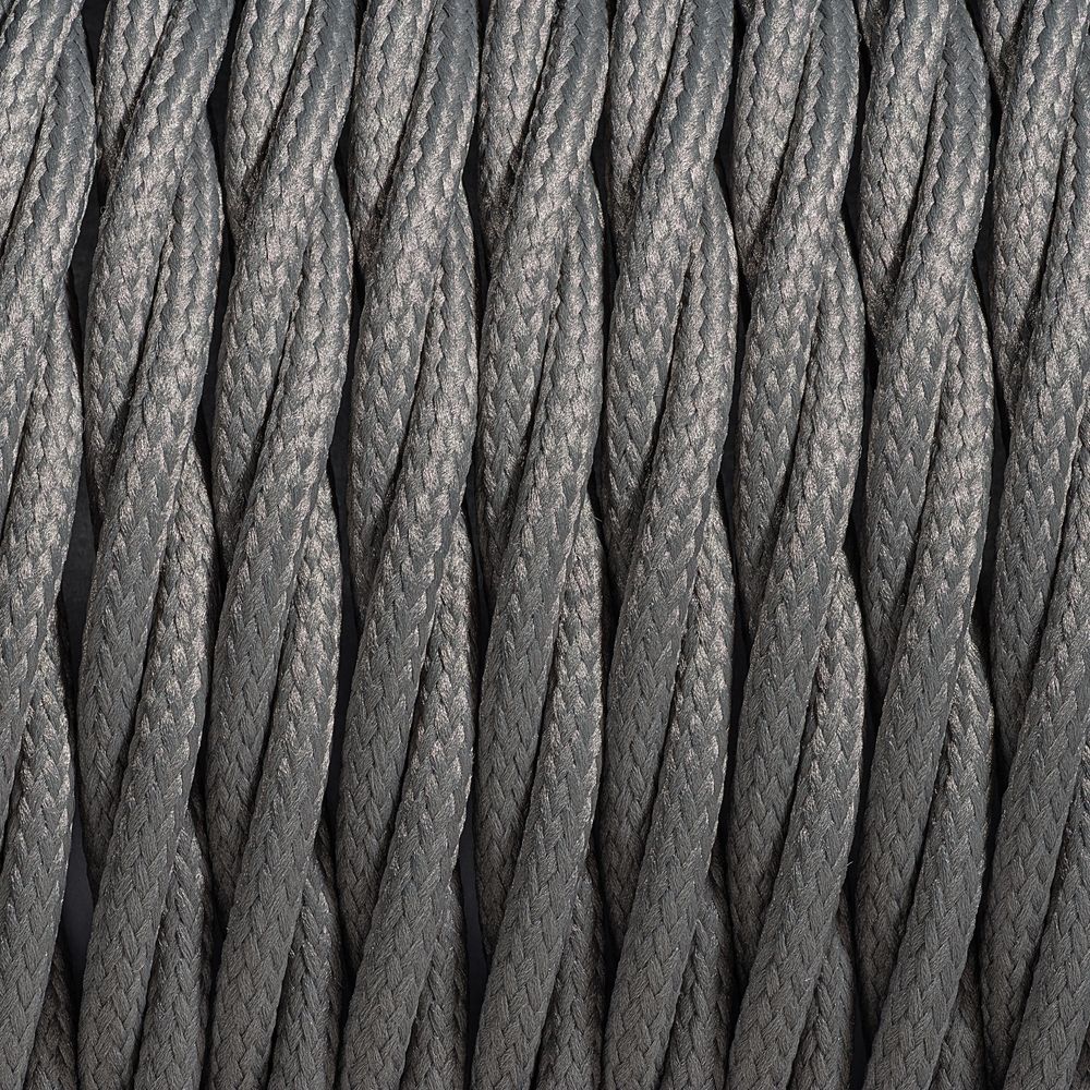 A macro photograph of interwoven braided cables, representing the structural integration of creator partnerships and consolidated rights management.