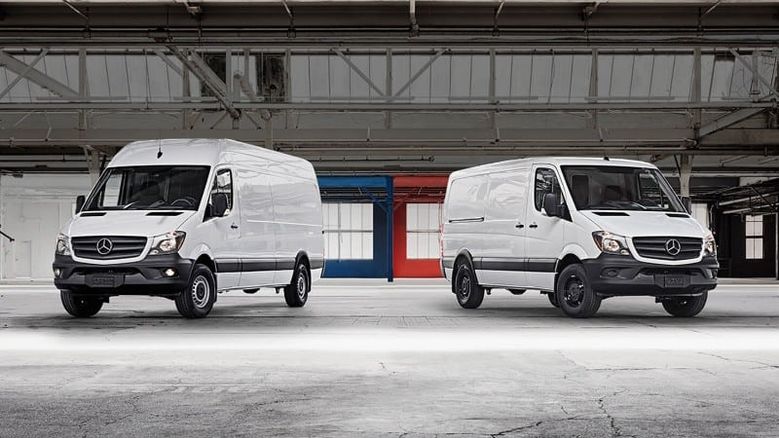 Two Mercedes-Benz Sprinter vans in warehouse — ideal commercial vehicles for Irish business owners seeking van finance, leasing, or fleet funding options