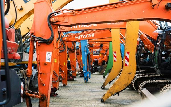 Row of Hitachi and Liebherr excavators in Ireland — construction plant machinery and heavy equipment for hire, finance, and contractors
