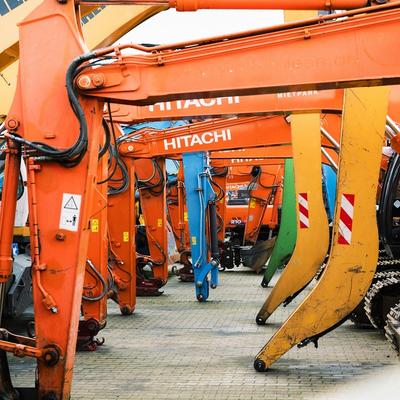 Row of Hitachi and Liebherr excavators in Ireland — construction plant machinery and heavy equipment for hire, finance, and contractors